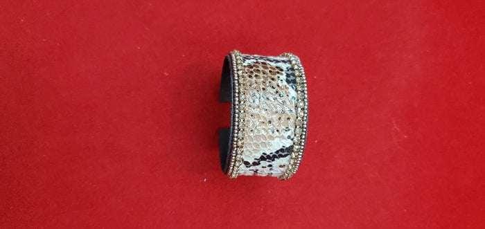 Adjustable Animal leather cuffs with champagne stone border