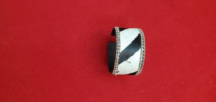 Adjustable Animal leather cuffs with champagne stone border