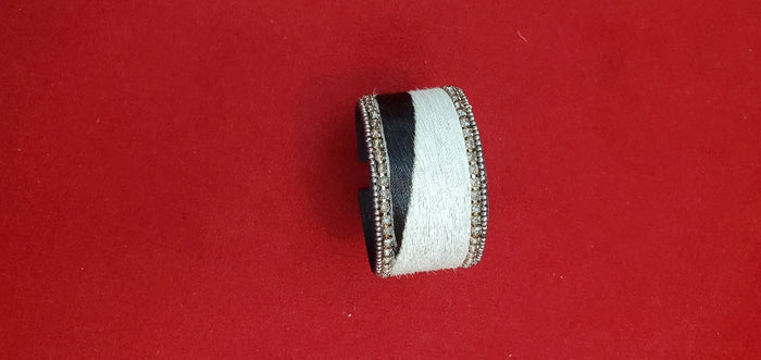 Adjustable Animal leather cuffs with champagne stone border