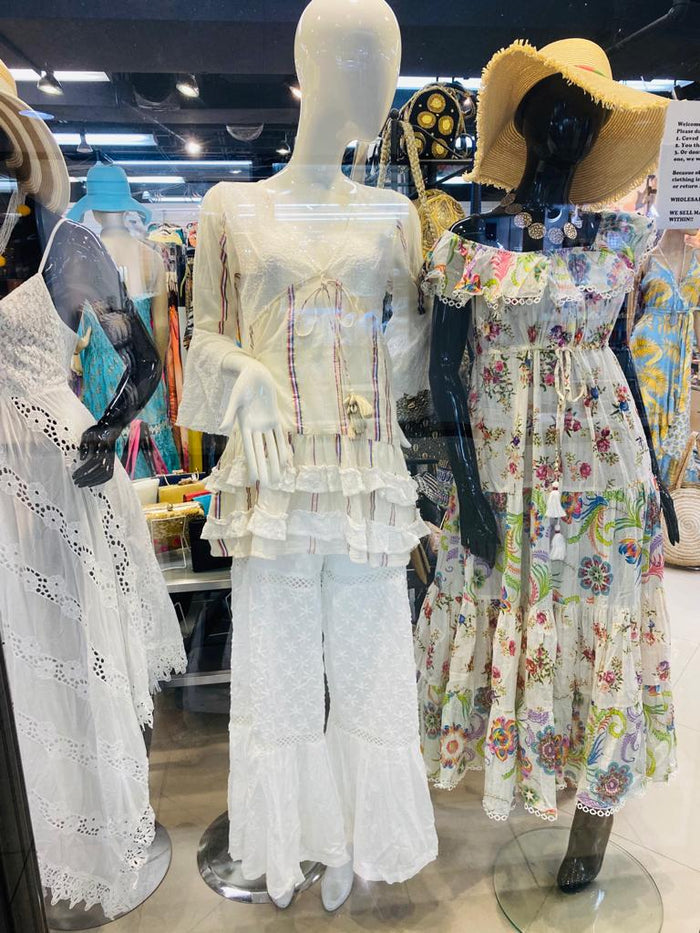 White ruffle top and tiered pants set